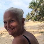 Maya, donation box manager for Rob’s Dogs supporting spay and neuter efforts in Koh Samui